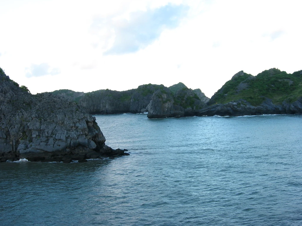Clouds and changing light above Lan Ha Bay limestone islands
