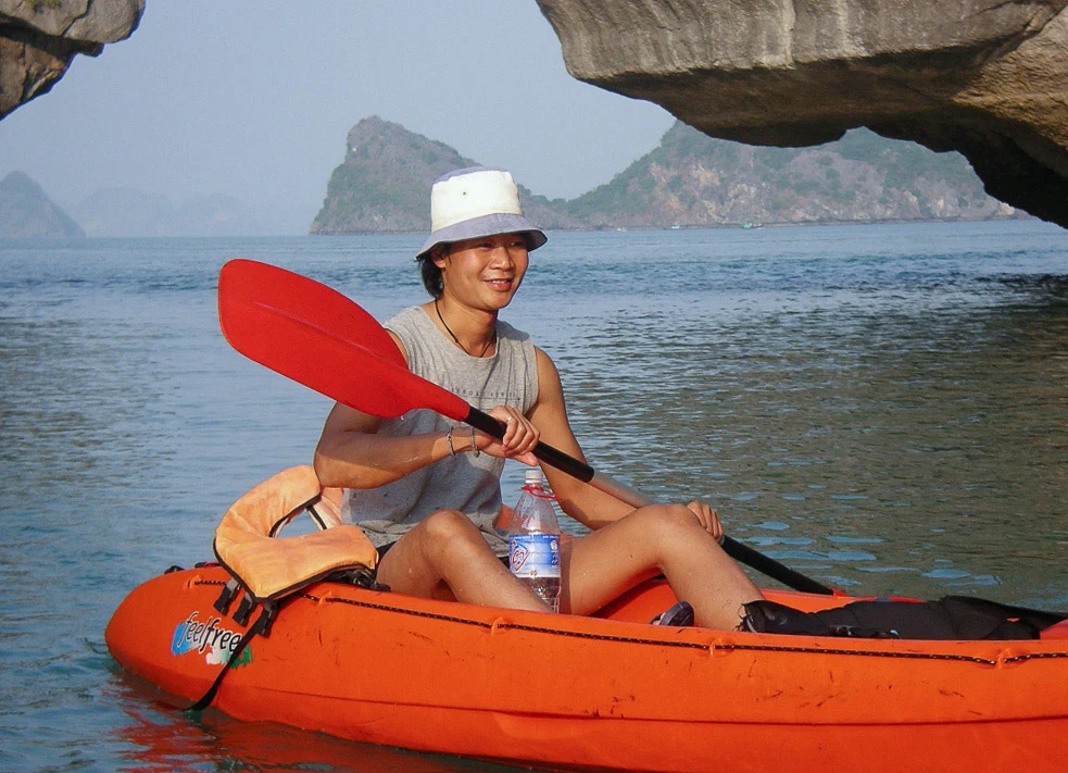 Local guide Trung in a kayak off Cat Ba in 2004