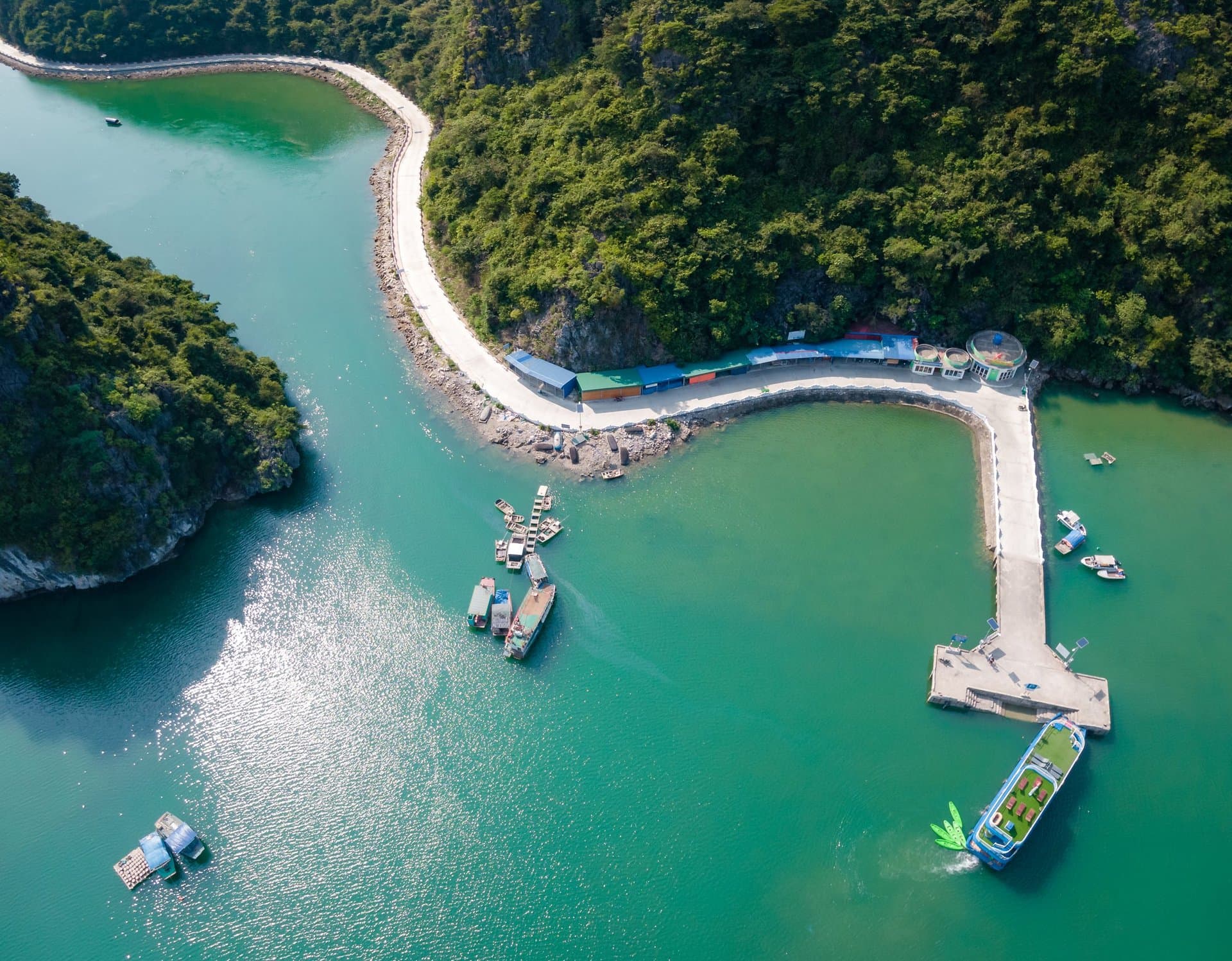 Limestone karsts rising from emerald water in Lan Ha Bay
