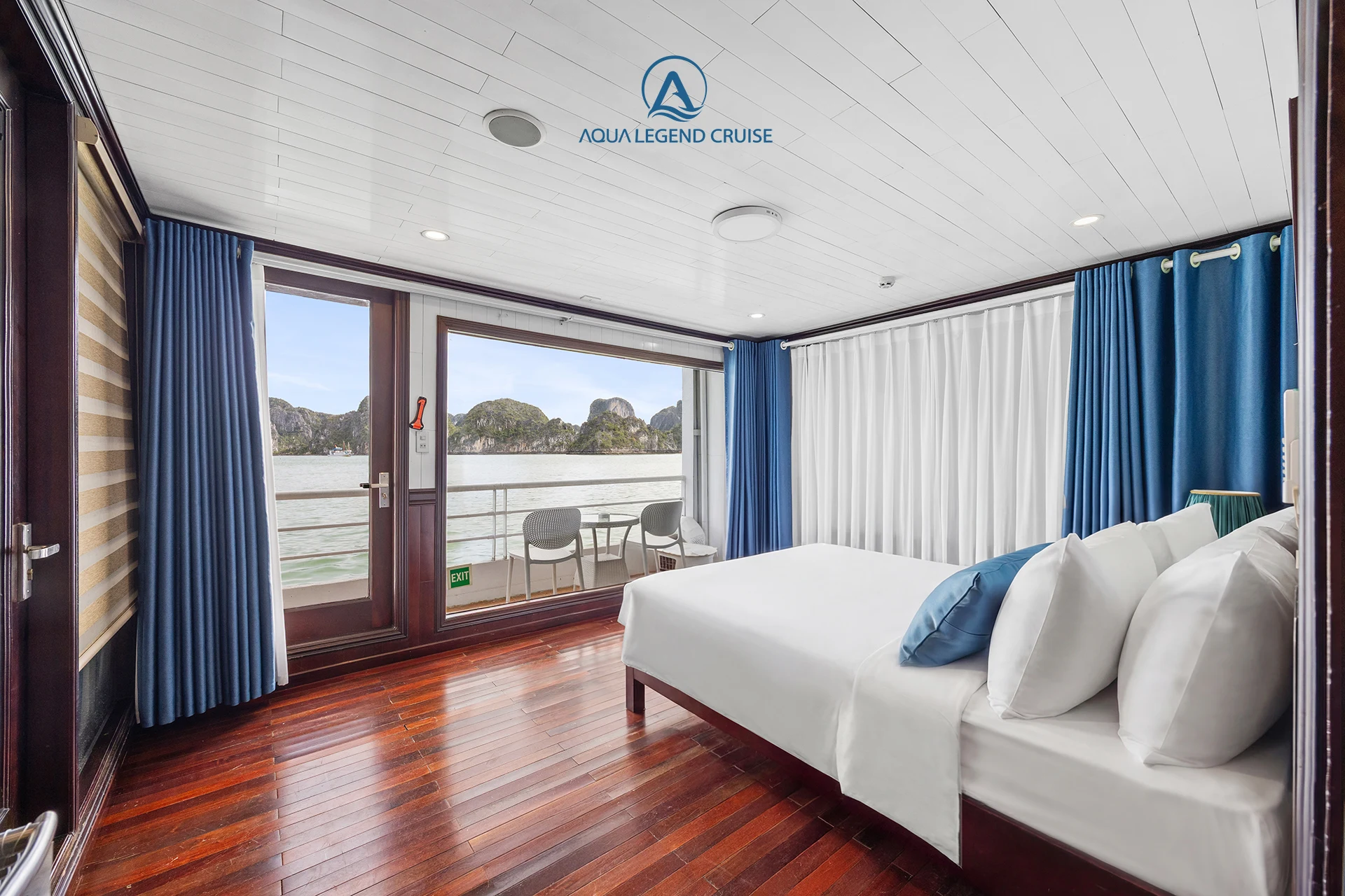 Junior Suite Balcony cabin with a double bed on Aqua Legend Cruise