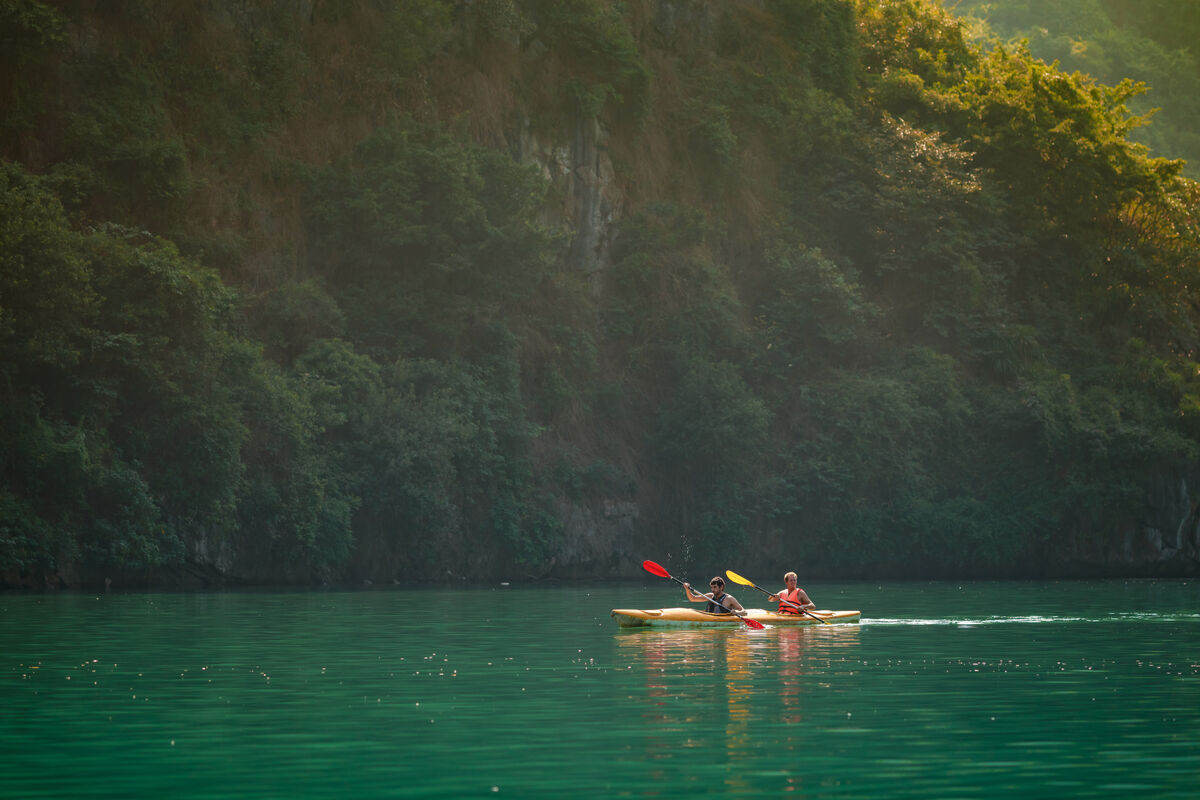 Paddling toward limestone karsts in Lan Ha Bay